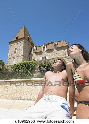 young man and woman by pool View Large Photo Image Stock Photograph - young man and woman by pool. Fotosearch