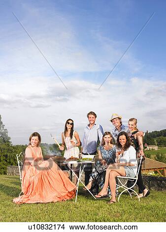 young people having barbecue View Large Photo Image Picture - young people having barbecue. Fotosearch