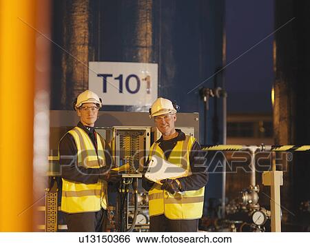 Stock Photograph - Young Port Worker Undergoing Training. Fotosearch
