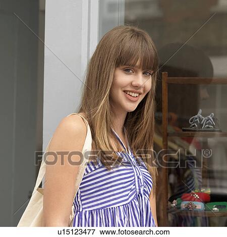 Stock Photo - young woman smiling. Fotosearch