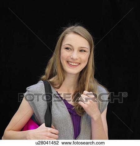 Stock Image - Young woman with bag. Fotosearch