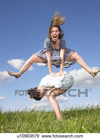 young women playing leapfrog View Large Photo Image Stock Photo - young women playing leapfrog. Fotosearch