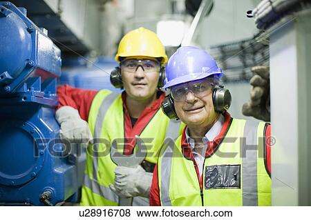 2 workers in engine room View Large Photo Image Stock Photo - 2 workers in engine room. Fotosearch