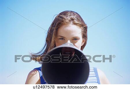 A girl with a mega phone View Large Photo Image Stock Photo - A girl with a mega phone. Fotosearch