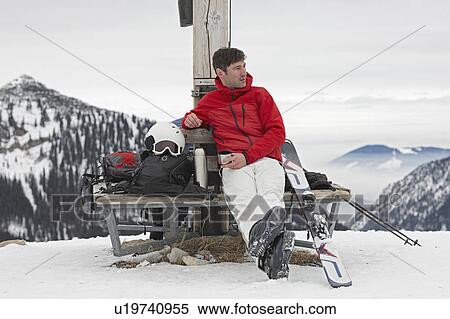 Alpinist resting on Bench View Large Photo Image Stock Photography - Alpinist resting on Bench. Fotosearch