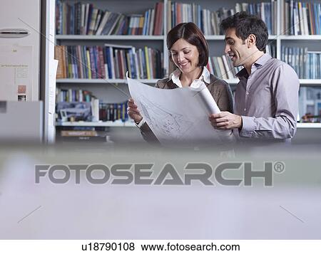 Architecht team discussing plans View Large Photo Image Stock Photo - Architecht team discussing plans. Fotosearch