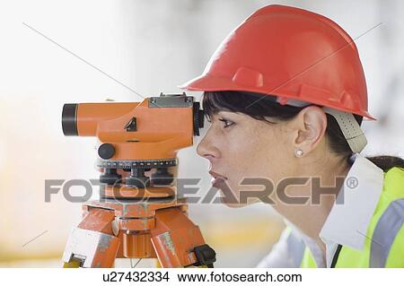 Architect doing measuring View Large Photo Image Picture - Architect doing measuring. Fotosearch