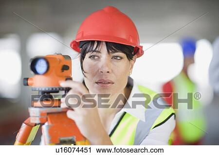 Architect doing measuring View Large Photo Image Stock Image - Architect doing measuring. Fotosearch