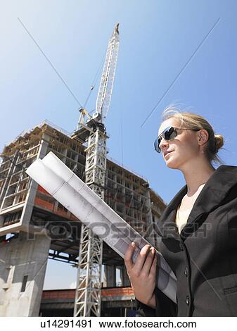 Architect with blue prints in the street View Large Photo Image Stock Image - Architect with blue prints in the street. Fotosearch