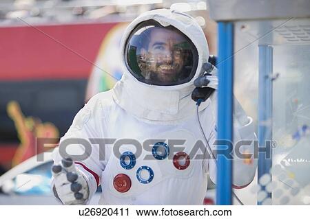 Astronaut calling home View Large Photo Image Stock Image - Astronaut calling home. Fotosearch
