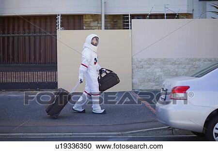 Stock Image - Astronaut on the way home. Fotosearch