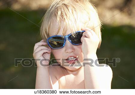 Baby boy with sunglasses View Large Photo Image Stock Image - Baby boy with sunglasses. Fotosearch
