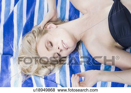 blonde woman on towel sexy View Large Photo Image Stock Photo - blonde woman on towel sexy. Fotosearch