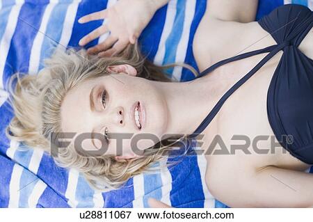 blonde woman on towel sexy View Large Photo Image Stock Photo - blonde woman on towel sexy. Fotosearch