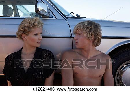 Stock Image - Boy looking at Girl. Fotosearch