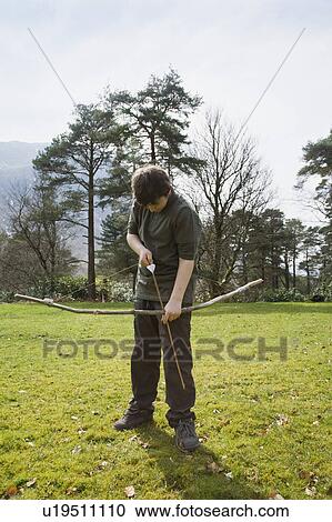 Boy with bow & arrow View Large Photo Image Stock Image - Boy with bow & arrow. Fotosearch