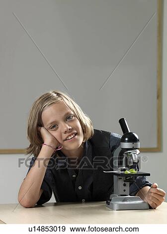 Stock Photo - Boy with microscope. Fotosearch
