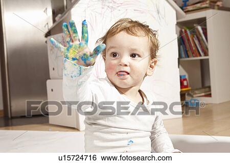 Boys hand covered with finger paint View Large Photo Image Stock Photograph - Boys hand covered with finger paint. Fotosearch