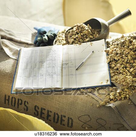 Stock Photograph - Brewery log and scoop with hops. Fotosearch