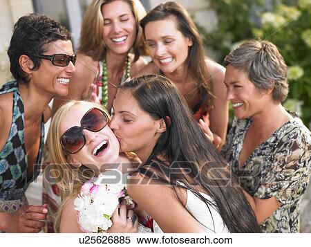 Stock Photography - Bride with her bridesmaids. Fotosearch