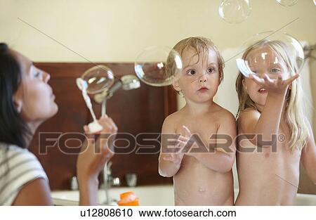 Brother and sister in bath, bubbles View Large Photo Image Stock Image - Brother and sister in bath, bubbles. Fotosearch