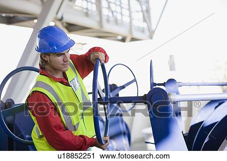 Builder doing maintenance works View Large Photo Image Stock Image - Builder doing maintenance works. Fotosearch