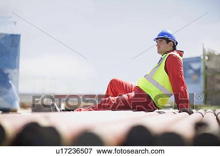 Building worker having a rest View Large Photo Image Stock Photo - Building worker having a rest. Fotosearch