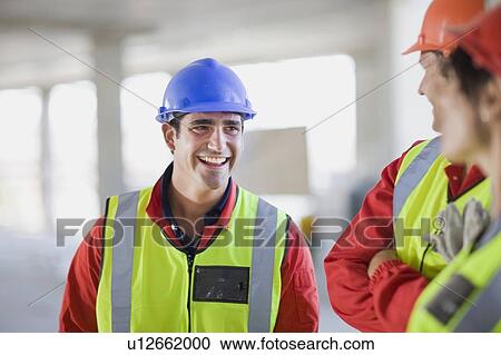 Building workers having fun View Large Photo Image Stock Image - Building workers having fun. Fotosearch