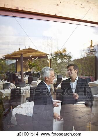 Picture - Buisness meeting in restaurant. Fotosearch