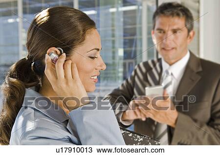 Business man and woman on the phone View Large Photo Image Stock Image - Business man and woman on the phone. Fotosearch
