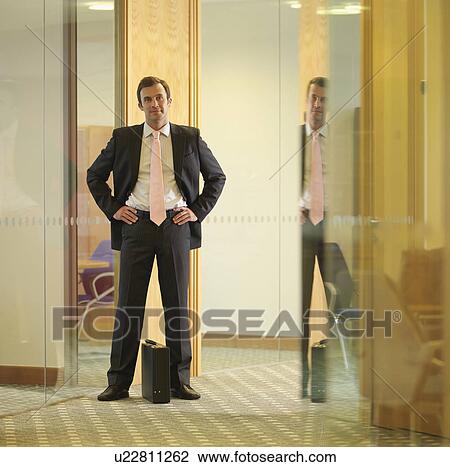 Business man hands on hips View Large Photo Image Stock Image - Business man hands on hips. Fotosearch