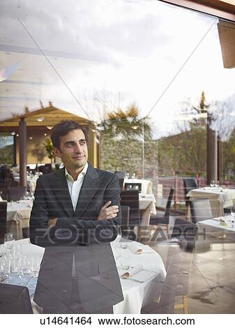Picture - Business man in Restaurant. Fotosearch