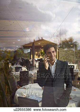 Stock Photograph - Business man in Restaurant. Fotosearch