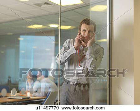 Business man on mobile View Large Photo Image Stock Image - Business man on mobile. Fotosearch