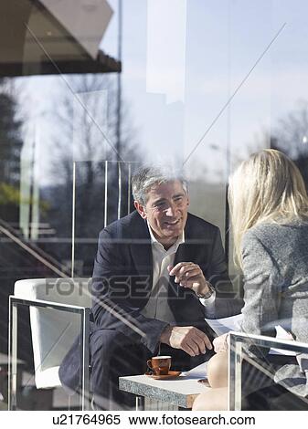 Stock Photography - Business Metting in Restaurant. Fotosearch