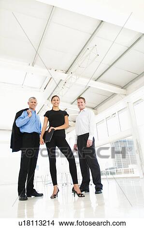Picture - Business team in bright office. Fotosearch