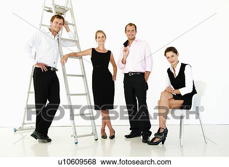 Stock Photo - Business team in bright office. Fotosearch