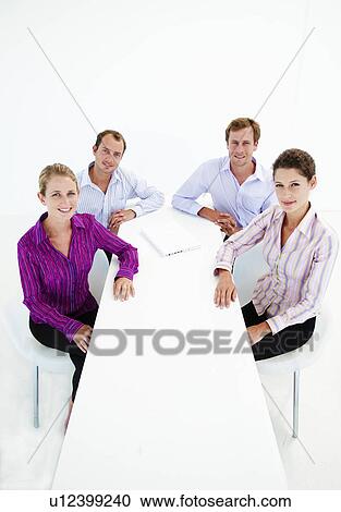 Stock Image - Business team look to camera. Fotosearch