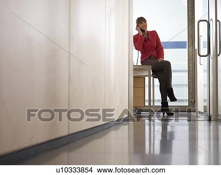Business Woman in Office on the Phone View Large Photo Image Picture - Business Woman in Office on the Phone. Fotosearch