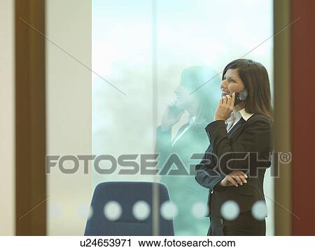 Business woman on the phone View Large Photo Image Stock Image - Business woman on the phone. Fotosearch