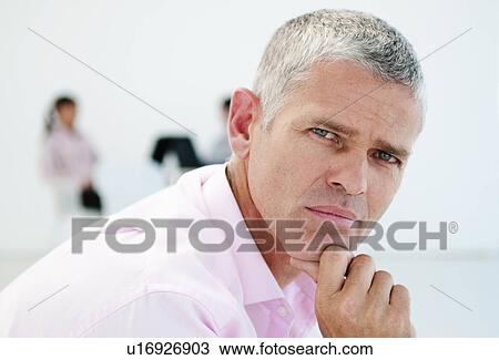 Businessman and colleagues View Large Photo Image Stock Image - Businessman and colleagues. Fotosearch