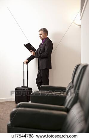 Businessman on business trip View Large Photo Image Stock Photo - Businessman on business trip. Fotosearch
