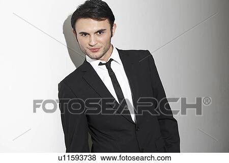 Businessman standing View Large Photo Image Stock Photo - Businessman standing. Fotosearch
