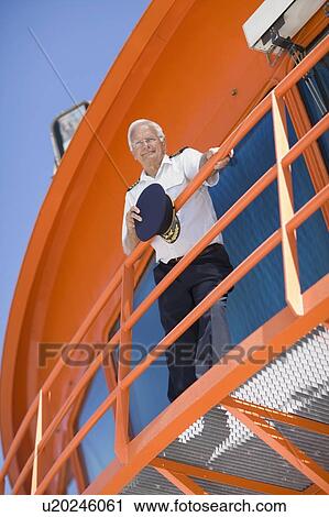 Captain on a floating bridge View Large Photo Image Stock Image - Captain on a floating bridge. Fotosearch