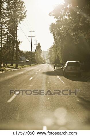 Cars parked on suburban street View Large Photo Image Stock Image - Cars parked on suburban street. Fotosearch