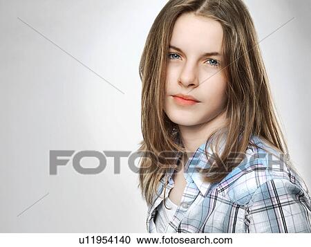 Stock Image - Close up of smiling teenage girl. Fotosearch