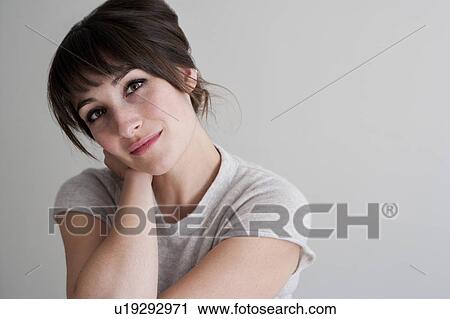 Close up of smiling woman View Large Photo Image Stock Image - Close up of smiling woman. Fotosearch