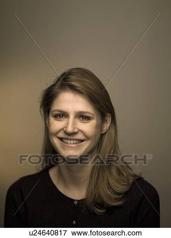Stock Photo - Close up of smiling woman. Fotosearch