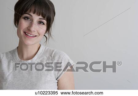 Stock Photography - Close up of smiling woman. Fotosearch