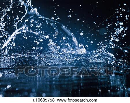 Close up of splashing water View Large Photo Image Stock Photo - Close up of splashing water. Fotosearch